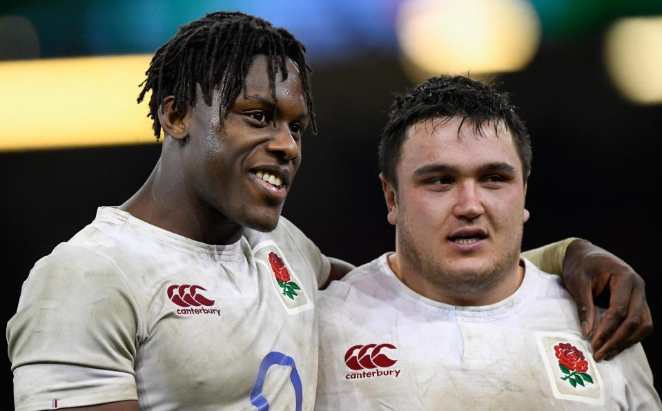 Itoje and influential sub Jamie George celebrate a the end in Cardiff