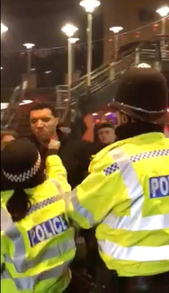  Officers could be seen shouting as they tried to calm the situation, hours after Deeney's side lost to Manchester United