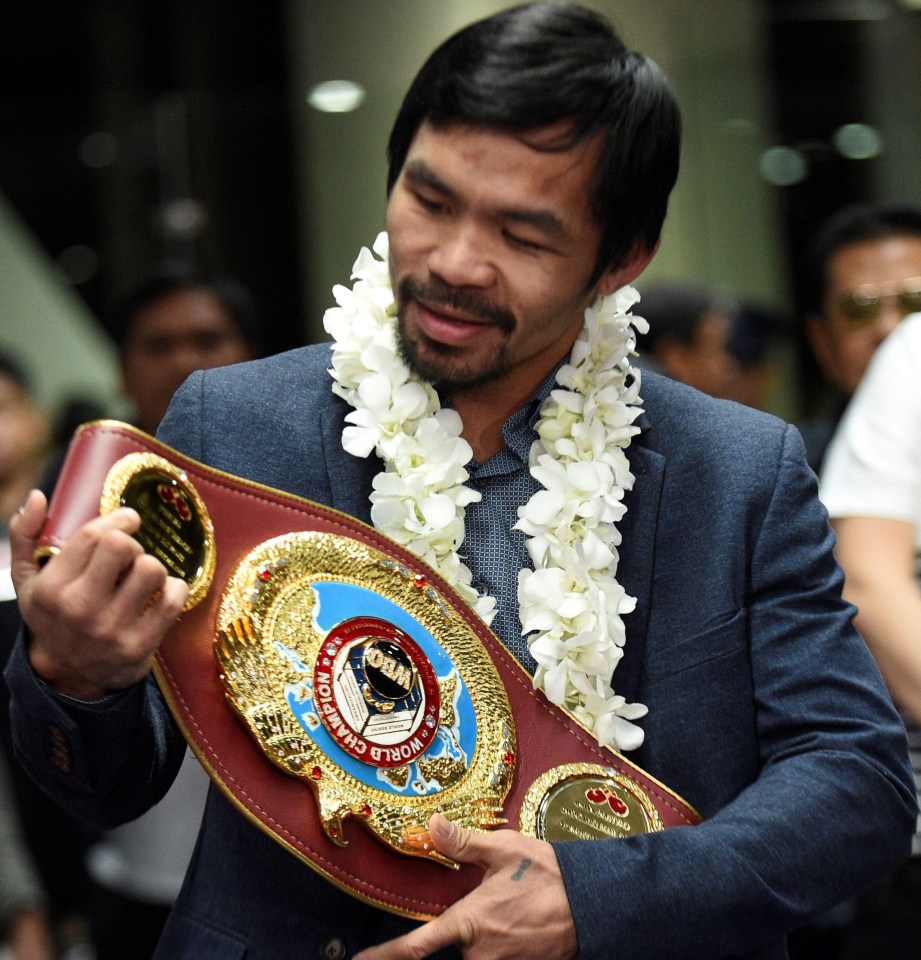 Manny Pacquiao celebrates his victory over Jessie Vargas