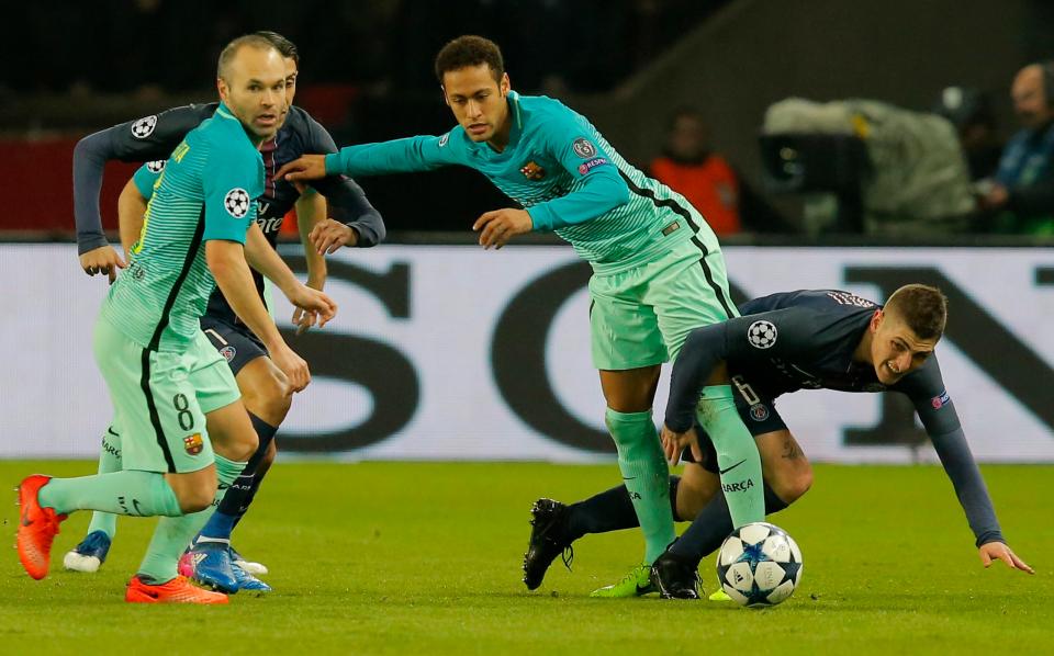 Verratti takes a tumbl during a challenge with Neymar