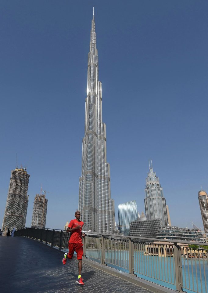 Mo Farah runs in front of the worlds biggest skyscraper the Burj Khalifa