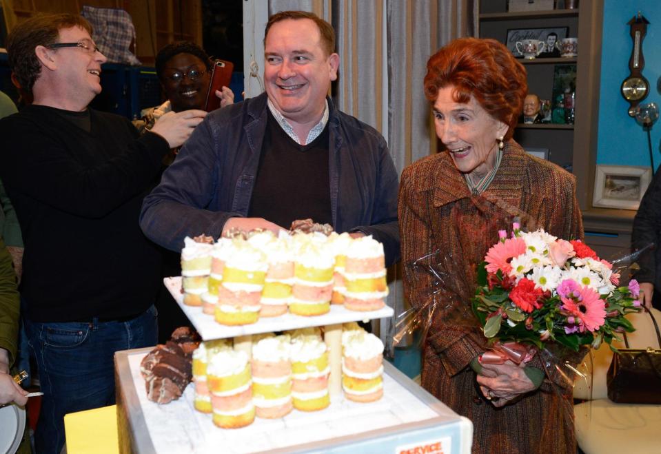 June Brown's EastEnders co-stars gathered around to surprise her with cake and flowers for her 90th birthday