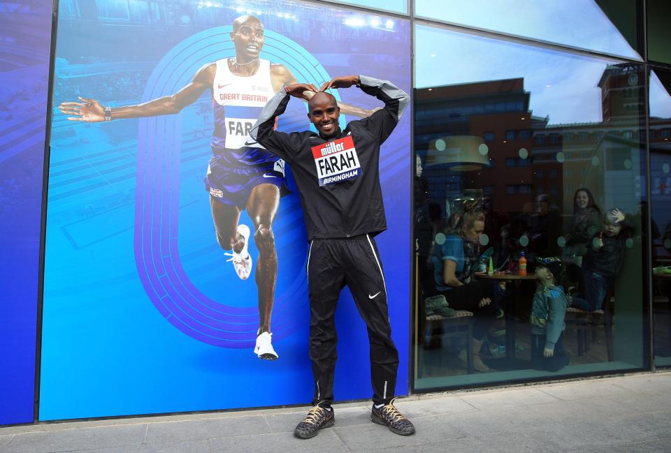 Farah does the mobot at a press conference in Birmingham today