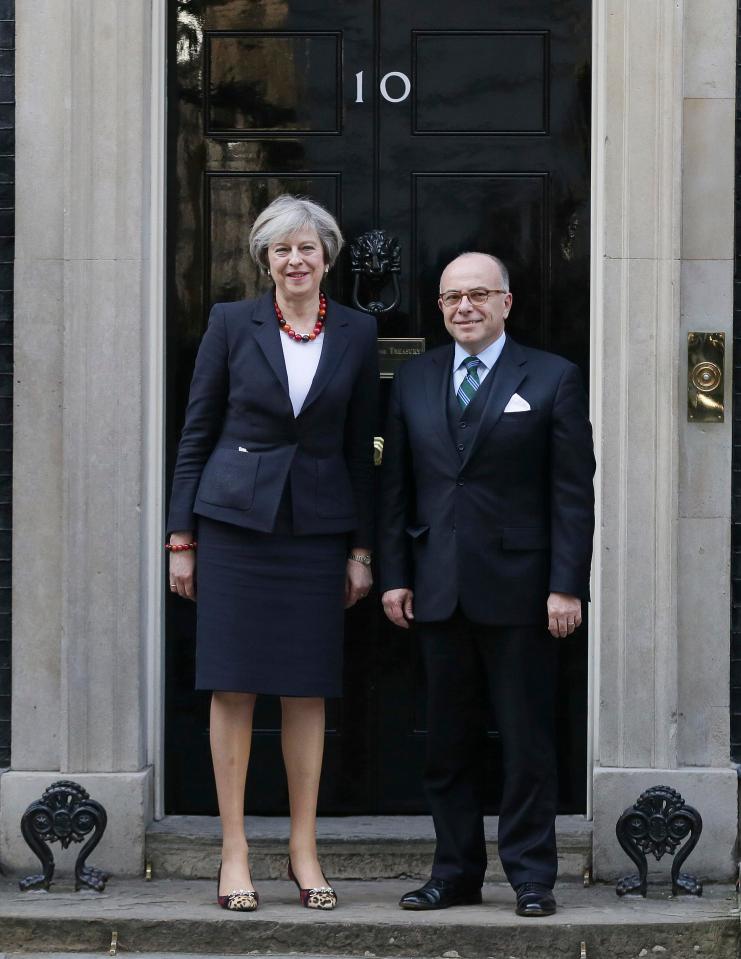  Theresa May with French Prime Minister Bernard Cazeneuve outside 10 Downing Street