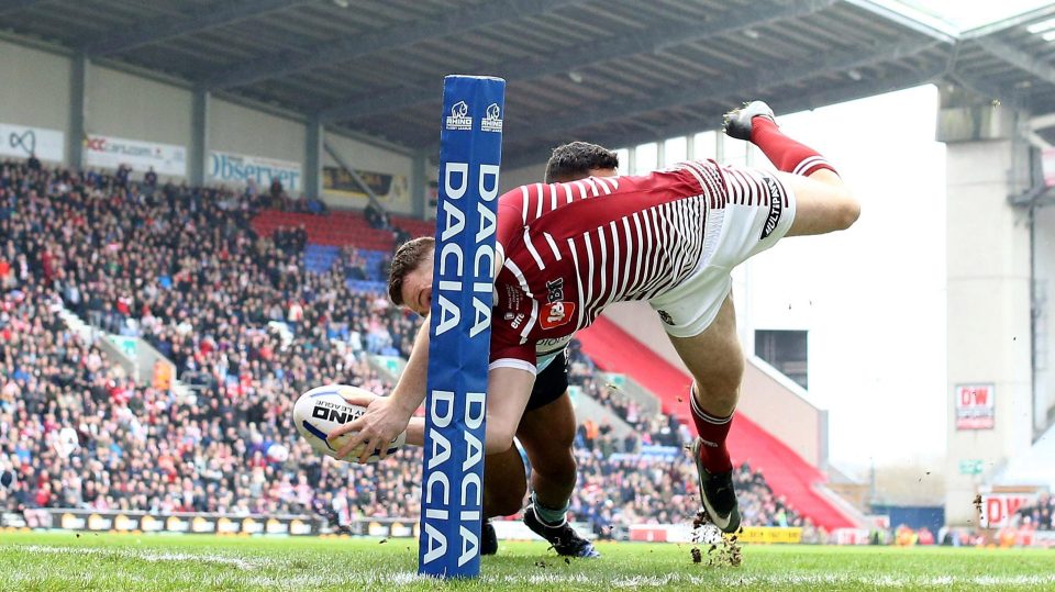 Burgess flies over on his way to an eye-catching, match-turning hat-trick