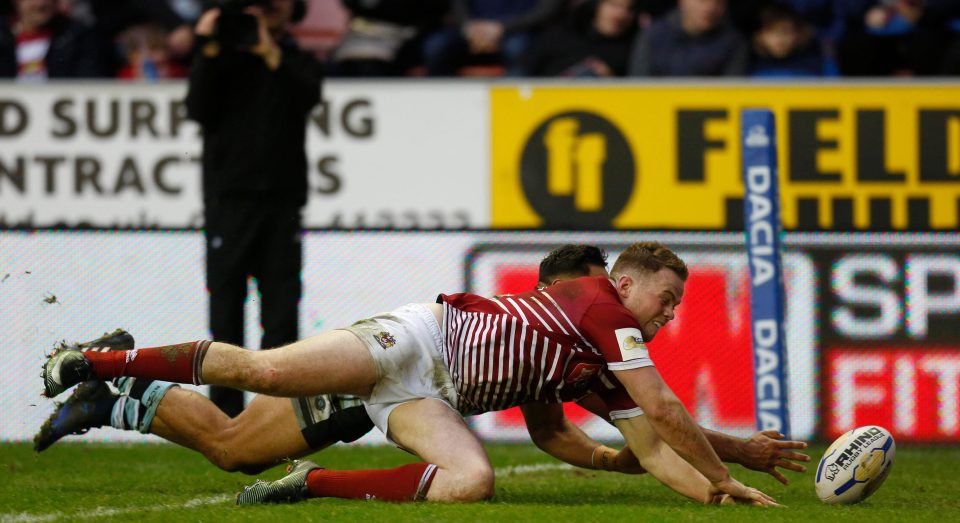 Burgess dives over for the opening try of a crushing win over Aussie side Cronulla