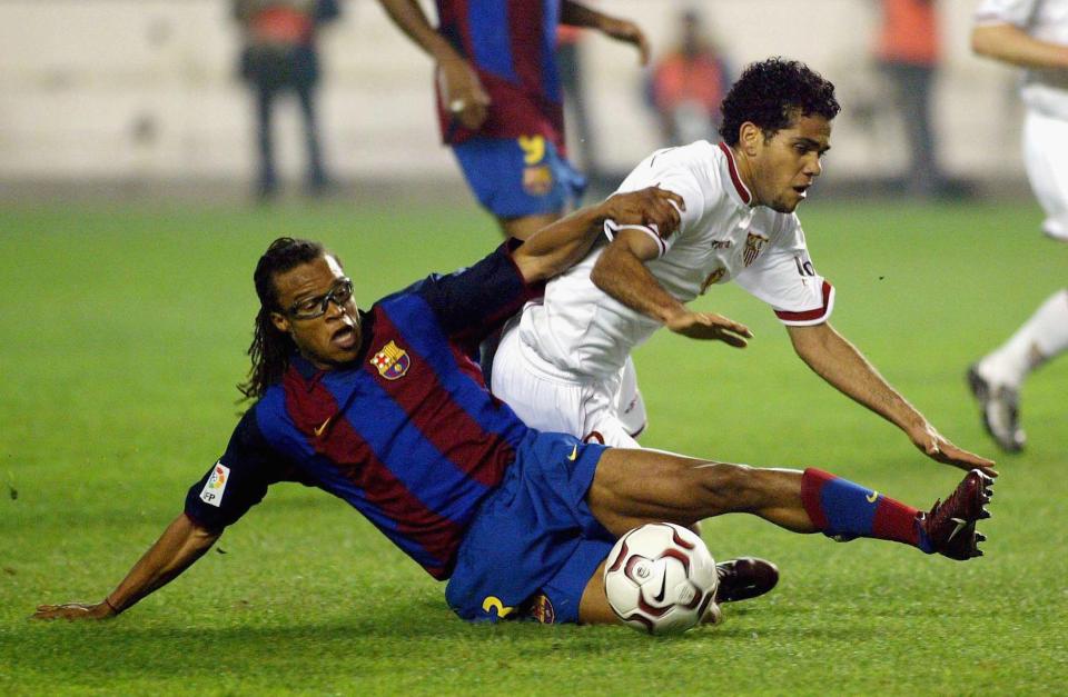 Dani Alves tackled by Barcelona's Edgar Davids during early Sevilla days