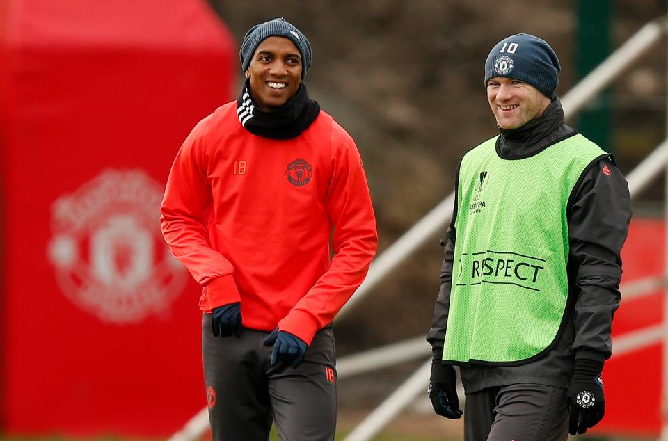  Wayne Rooney was all smiles as he trained this morning alongside Ashley Young