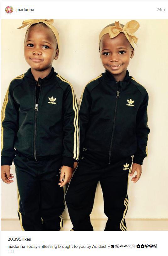  Madonna's newly adopted twins donned matching tracksuits