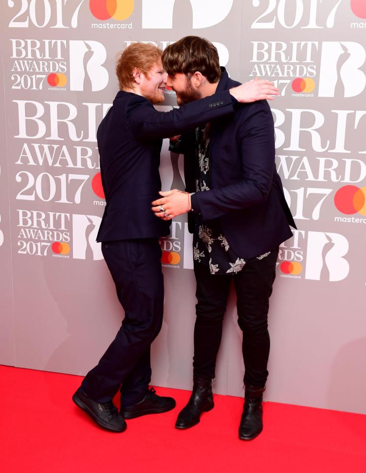  The pair hugged in front of the cameras