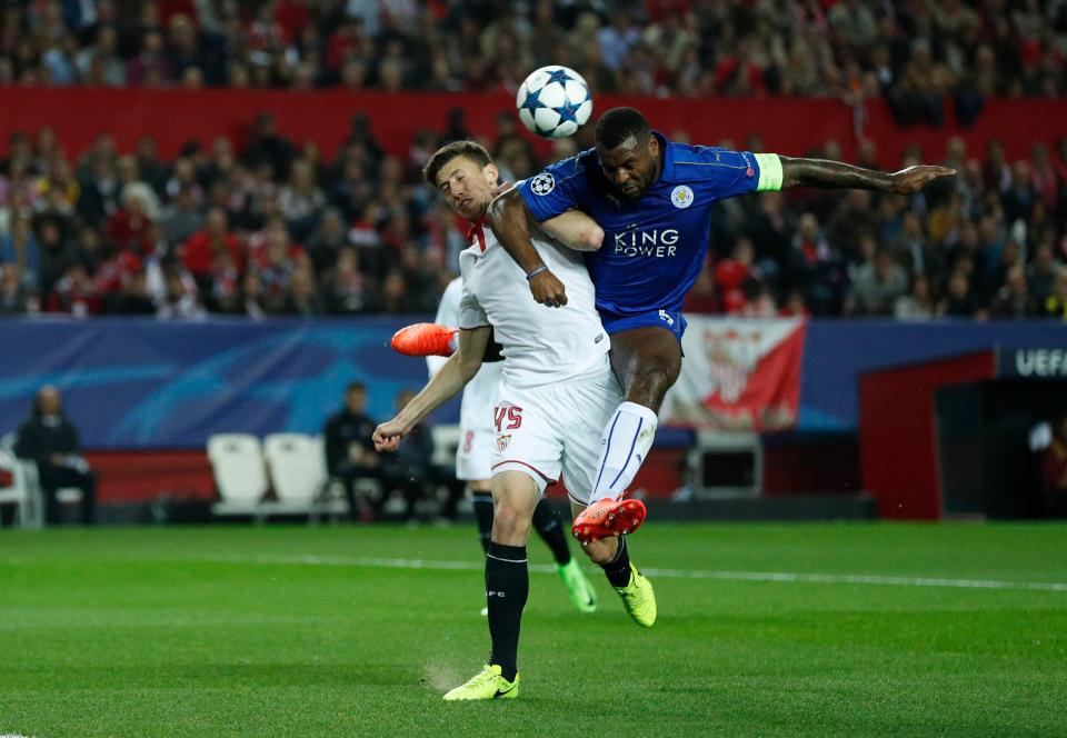 Leicester City's Wes Morgan in action with Sevilla's Clement Lenglet