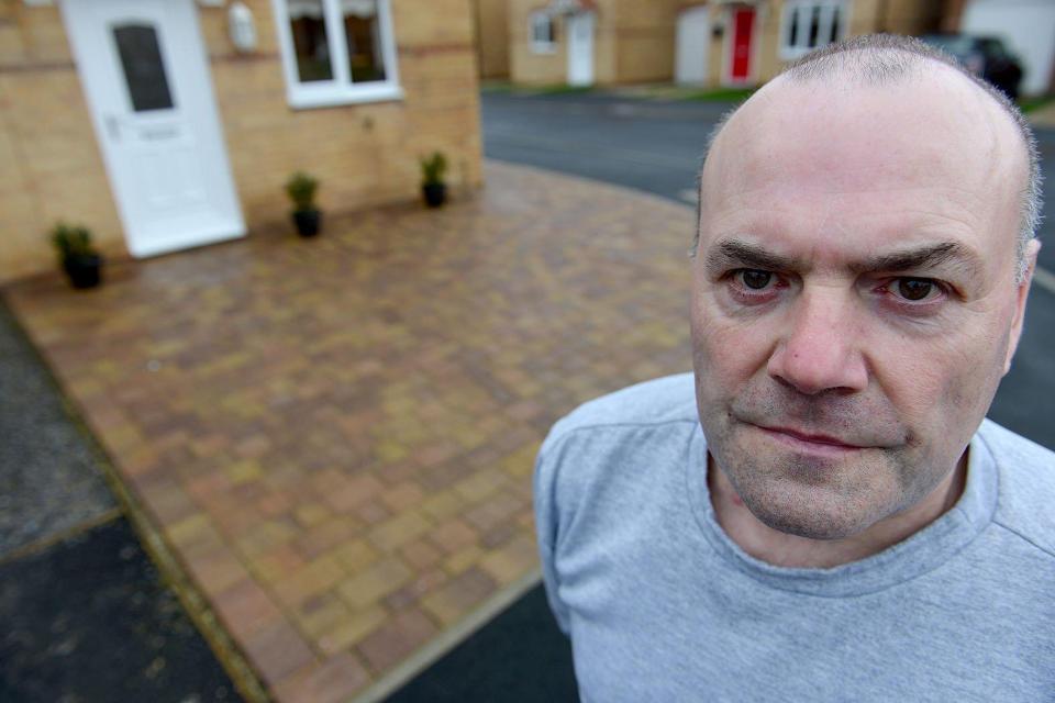  John Twidale has been threatened with court action after he paved over his front garden