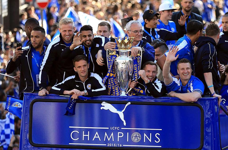 Claudi Ranieri and the Leicester players enjoy a coach trip as they parade the Premier League trophy around Leicester