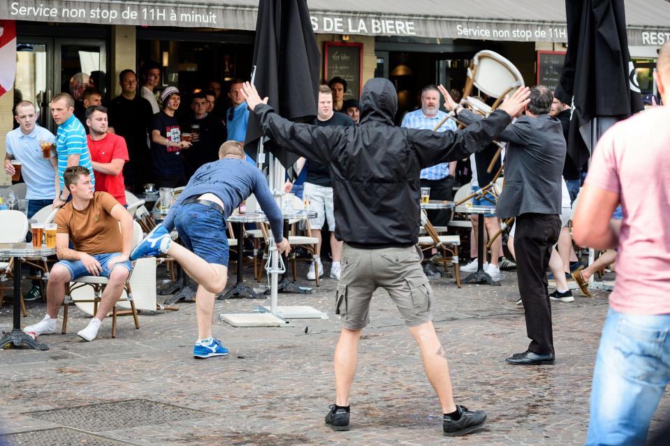 Russian men provoke a group of England supporters at Euro 2016 in France