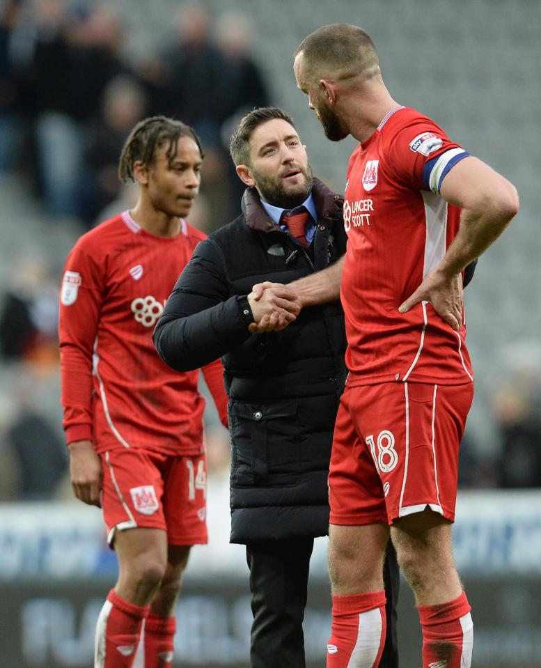  Bristol City manager Lee Johnson consoles his players as they yet again capitulate in the second hal