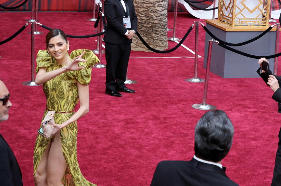  Her accidental flash was caught on camera outside the Dolby Theater