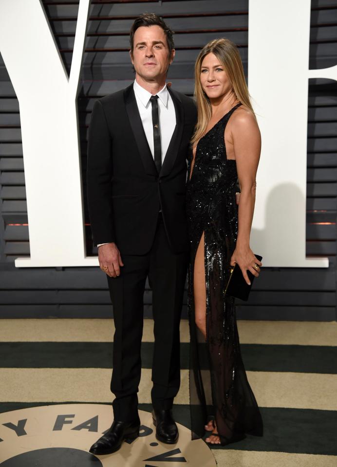  She was joined by husband Justin Theroux who looked handsome in his black suit