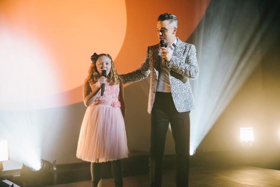  He appeared with her daughter Grace to perform a song from his new album, The Heavy Entertainment Show