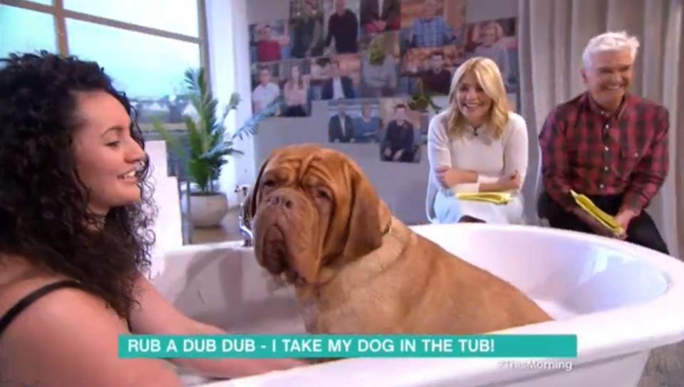  They chatted to a woman sitting in a bath with her dog