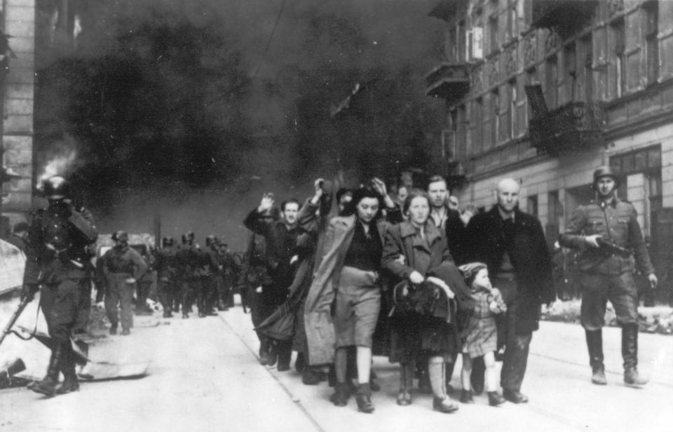  Horror... Polish Jews are marched out of Warsaw ghetto towards death camps in 1943