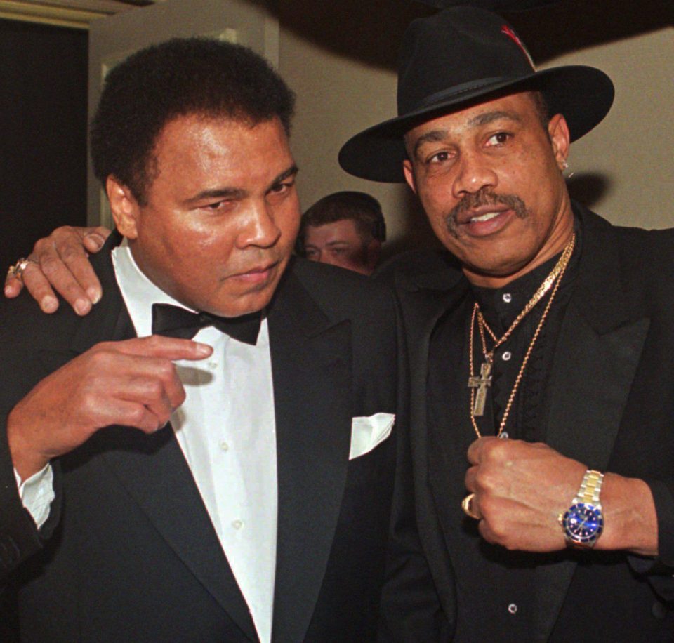 Muhammad Ali and Ken Norton get together during a celebrity benefit night