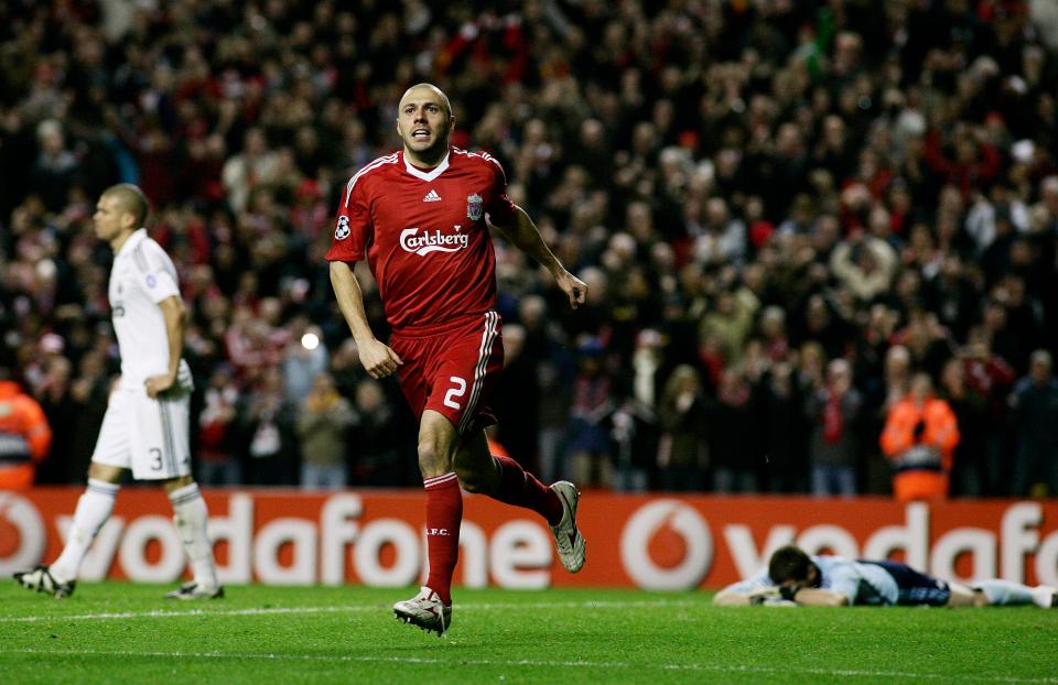  Andrea Dossena celebrates scoring for Liverpool against Real Madrid in 2009