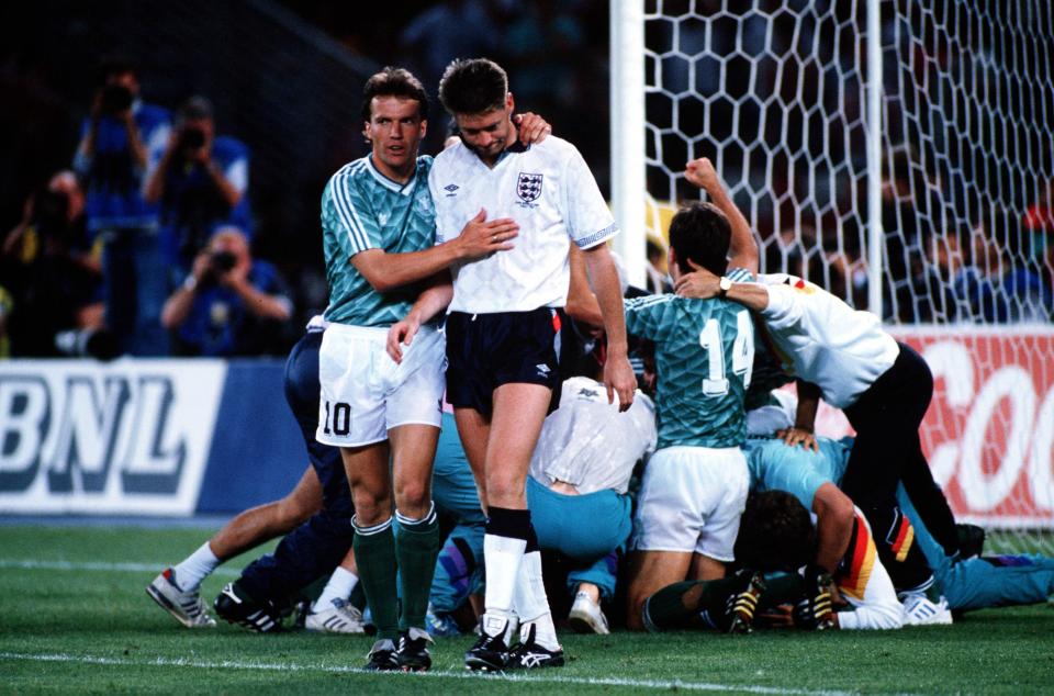 Chris Waddle is consoled as Germany players celebrate reaching 1990 final