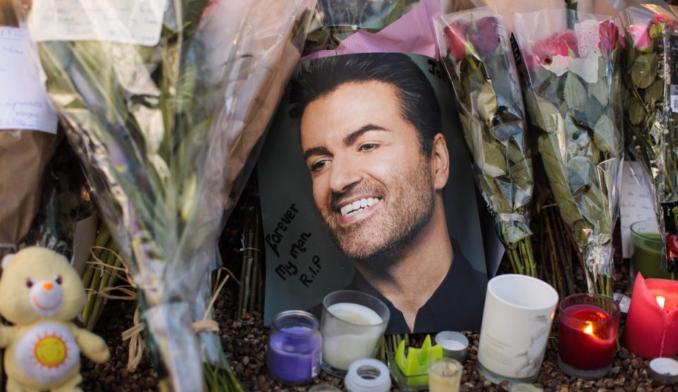  Tributes of flowers, photographs and candles left outside George Michael's home