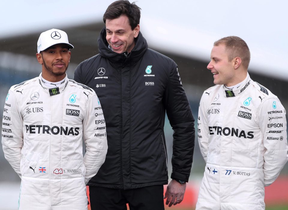 Toto Wolff with Mercedes drivers Lreis Hamilton and