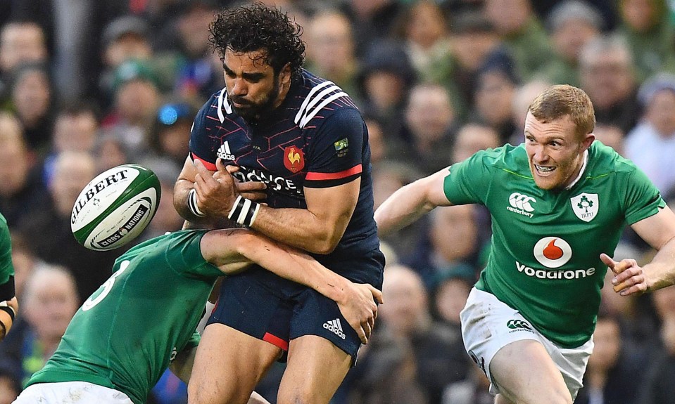 France’s Yoann Huget is tackled bu Ireland’s Garry Ringrose at the Aviva Stadium in Dublin