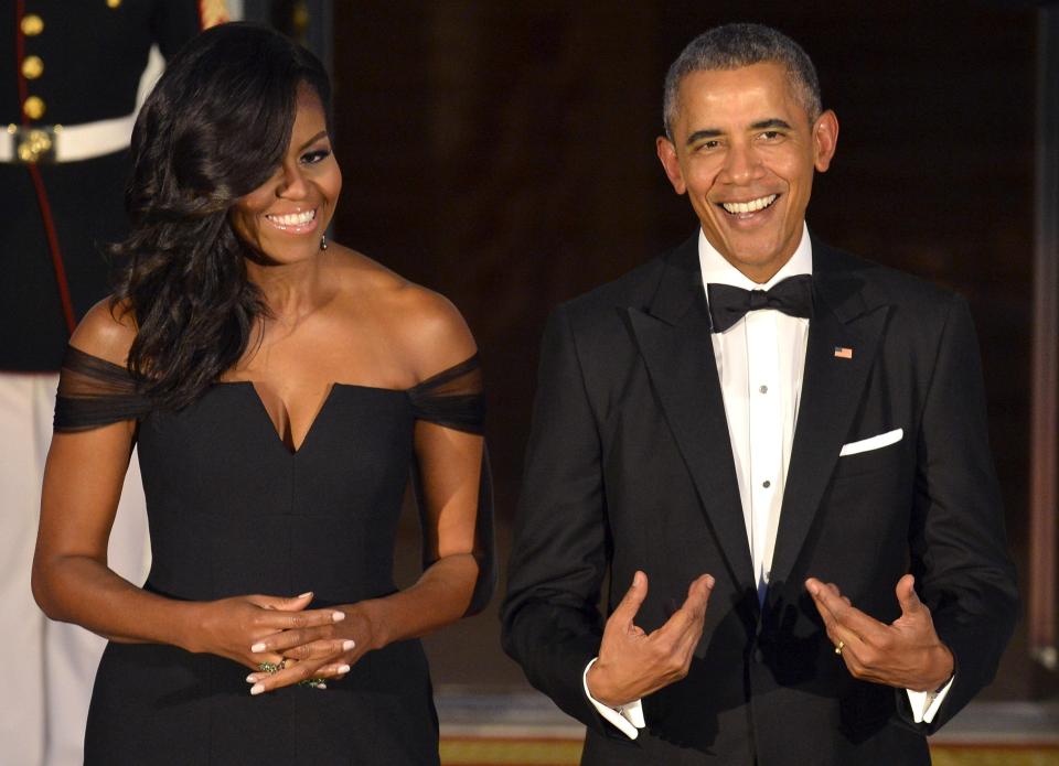  Barack and Michelle Obama have announced a £48million book deal for two volumes uncovering their time in the White House