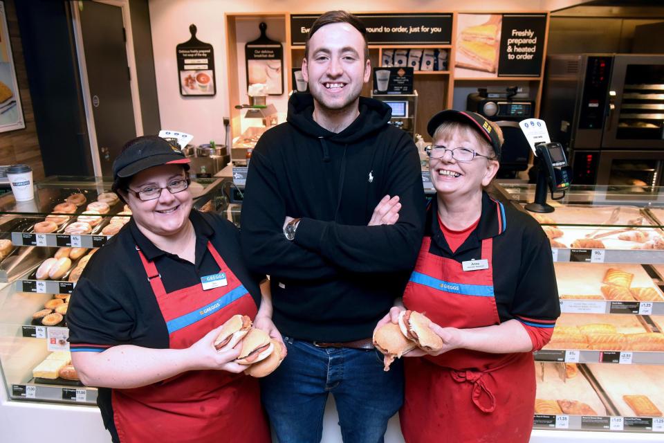 Josh, pictured with Greggs staff members Anna Steventon (left) and Bev Cutt (right), says the people behind the counter in his local branch in Chesterfield know him by name