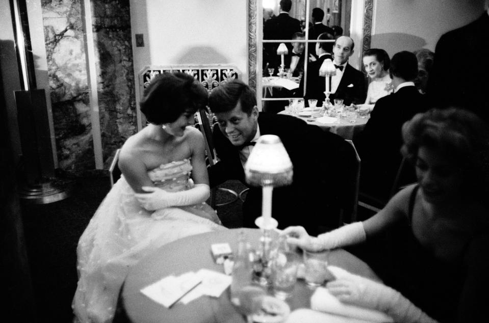  Senator (and future US President) Jack Kennedy pictured speaking to his wife Jacqueline at an event in 1956