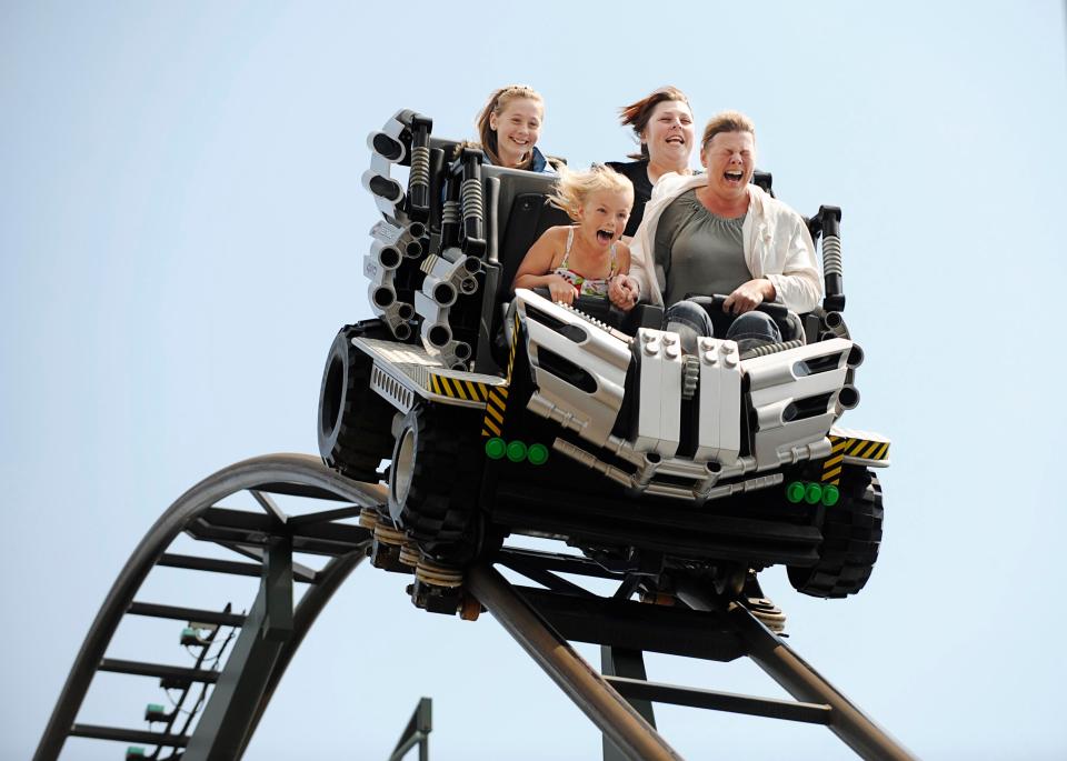  Thrill a minute . . . family speed down the X-treme Racers ride in Billund