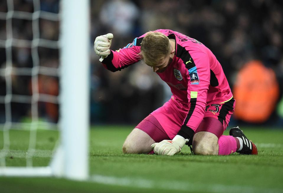 Huddersfield keeper Joel Coleman shows his frustration after his side surrendered their lead