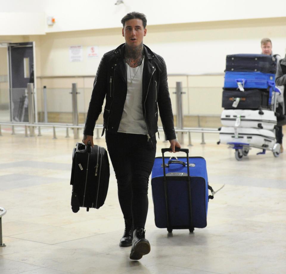  Jeremy McConnell was pictured with seven suitcases at Liverpool Airport