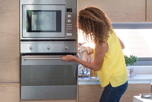 Chopped raw chicken then opened your oven without washing your hands? Those germs are now crawling all over your oven door handle