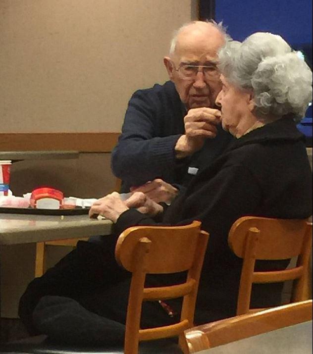 This photograph of 96-year-old man feeding his Alzheimer's stricken wife on a date night after 75 years of marriage has gone viral