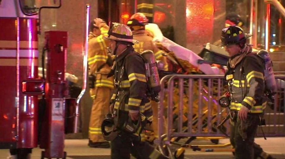  Firefighters can be seen outside the luxury hotel in the early hours of this morning