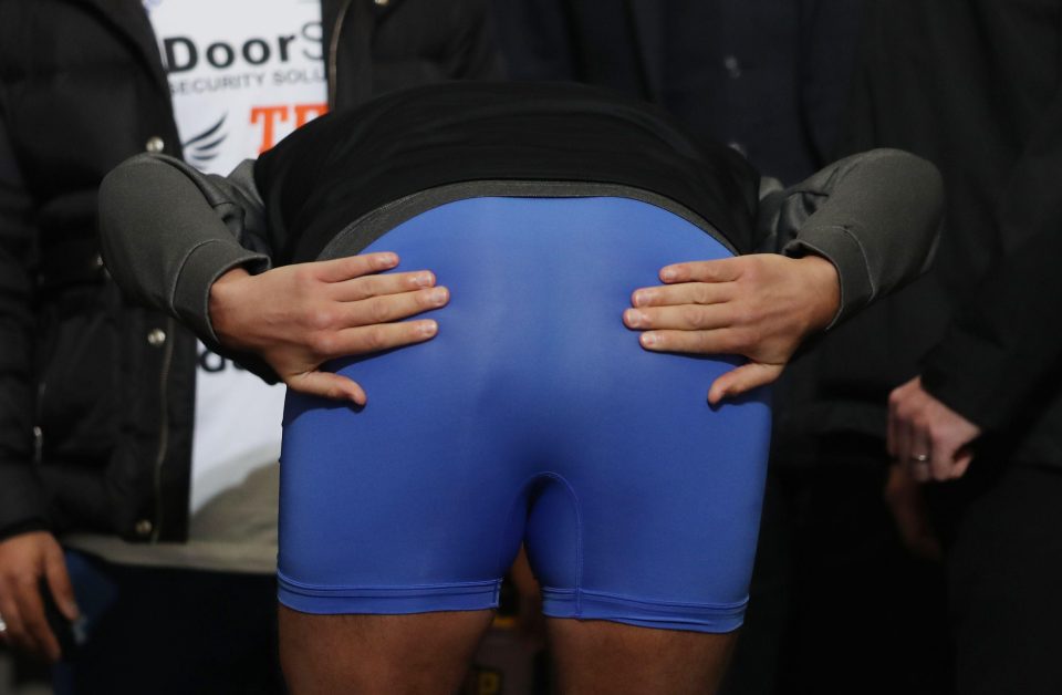  Bellew bent over and showed his bum as fans booed him at the weigh in