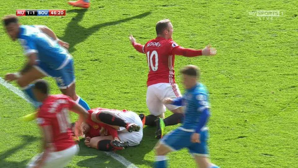  Tyrone Mings appears to stamp on the head of Zlatan Ibrahimovic moments earlier