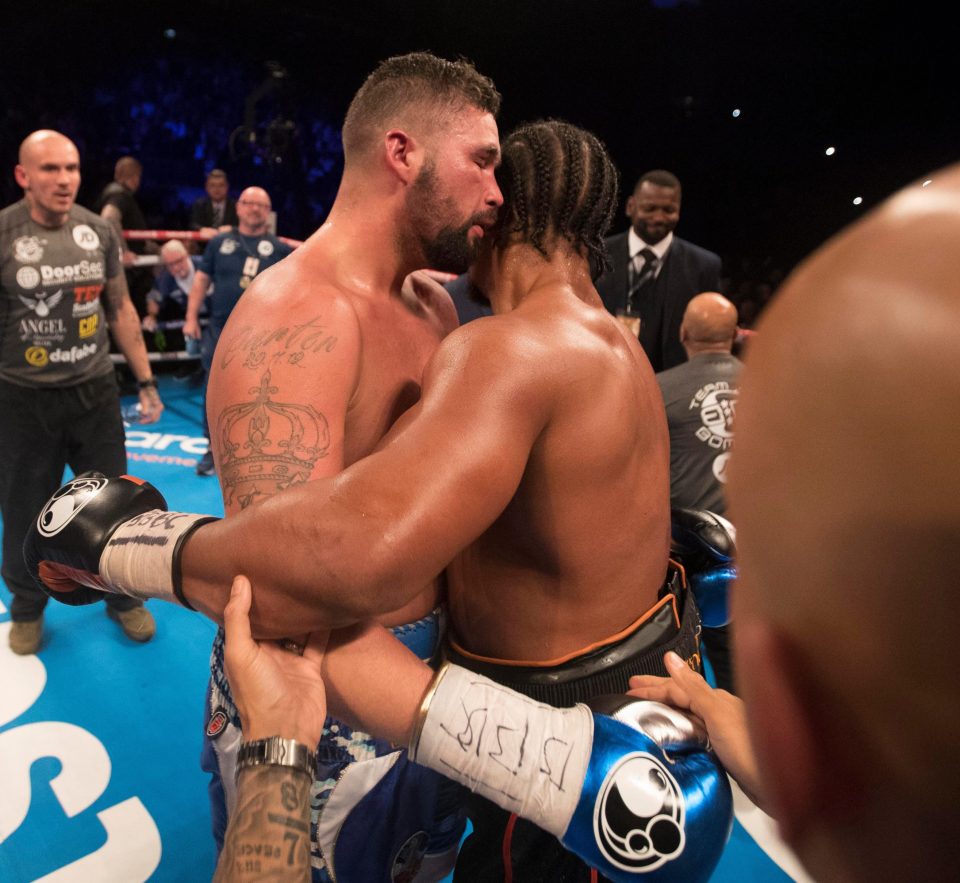  Old foes hug after the final bell in a touching mark of respect