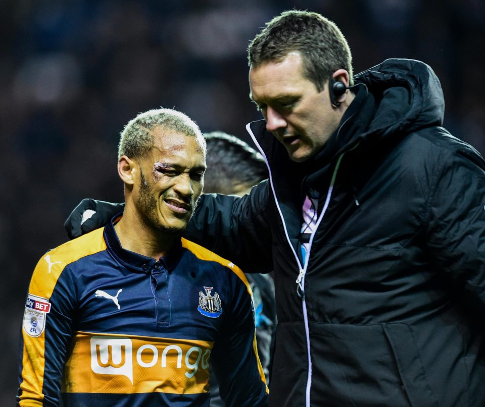 Newcastle's French attacker was then helped off the pitch after suffering an eye injury