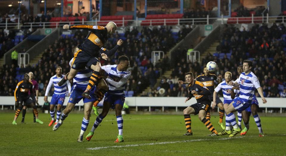 Jonjo Shelvey rises late on to aim a header at goal - but thankfully for Reading, it went over