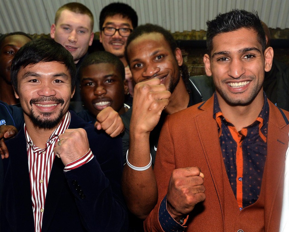 All smiles from Amir Khan and Manny Pacquiao before the fight was called off