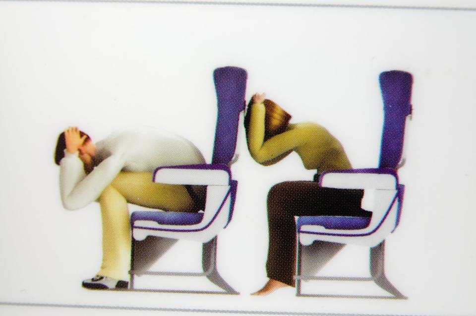  The brace position is designed to stop your body from hitting the seat in front of you