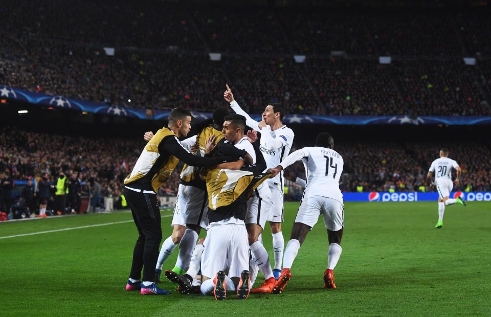 The PSG players celebrate Edinson Cavanis goal at the Nou Camp