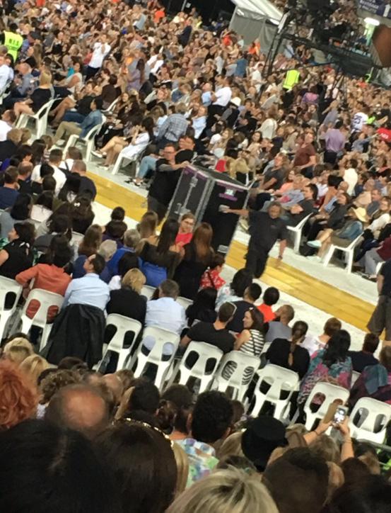  Box clever . . . Adele is wheeled through unsuspecting fans on her way to the stage