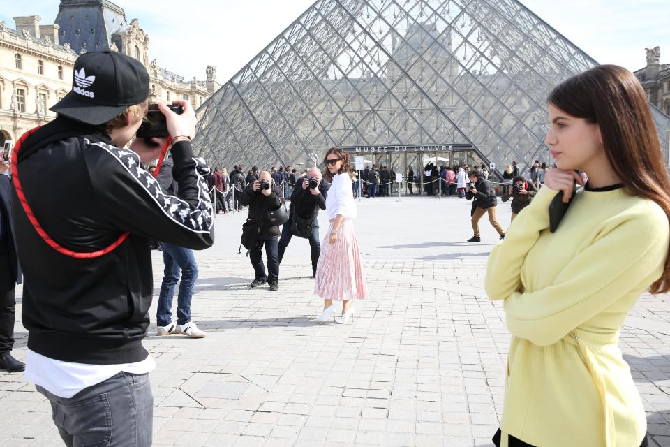  Brooklyn Beckham took a break from his Parisian date with Sonia Ben Ammar to take pictures of his mum Victoria outside the Louvre