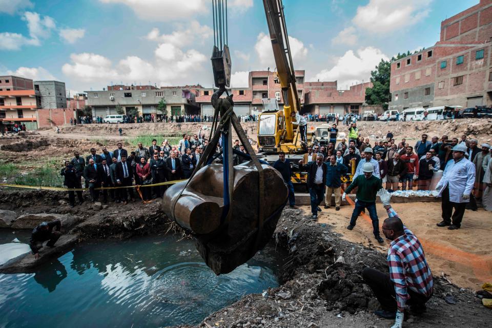 It took dozens of workers to safely guide it to dry land